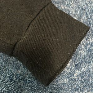 XL Mossy Oak Black hoodie with camo print in hood and camo American flag